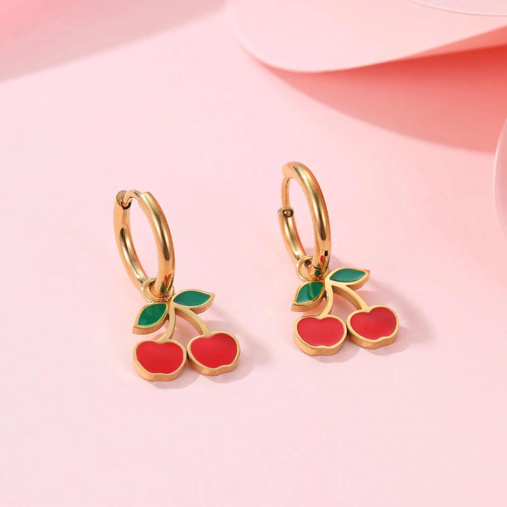 Complete cherry jewelry set with stainless steel necklace, bracelet, earrings, and ring with 18K gold electroplating.