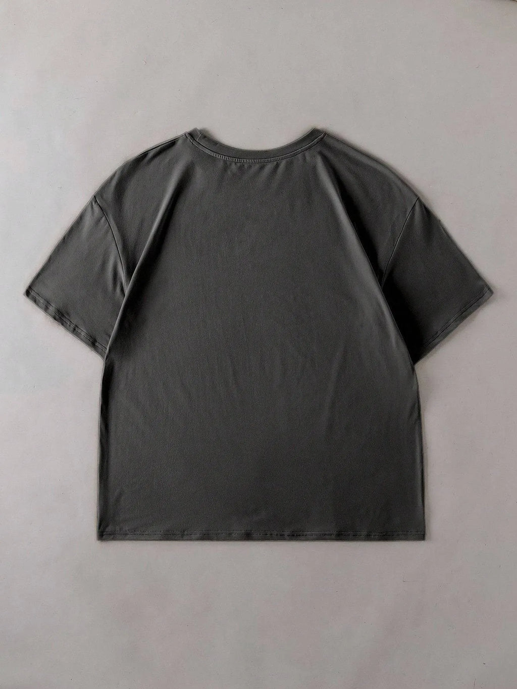 Cotton summer T-shirt with loose short sleeves and round neck in straight cut design