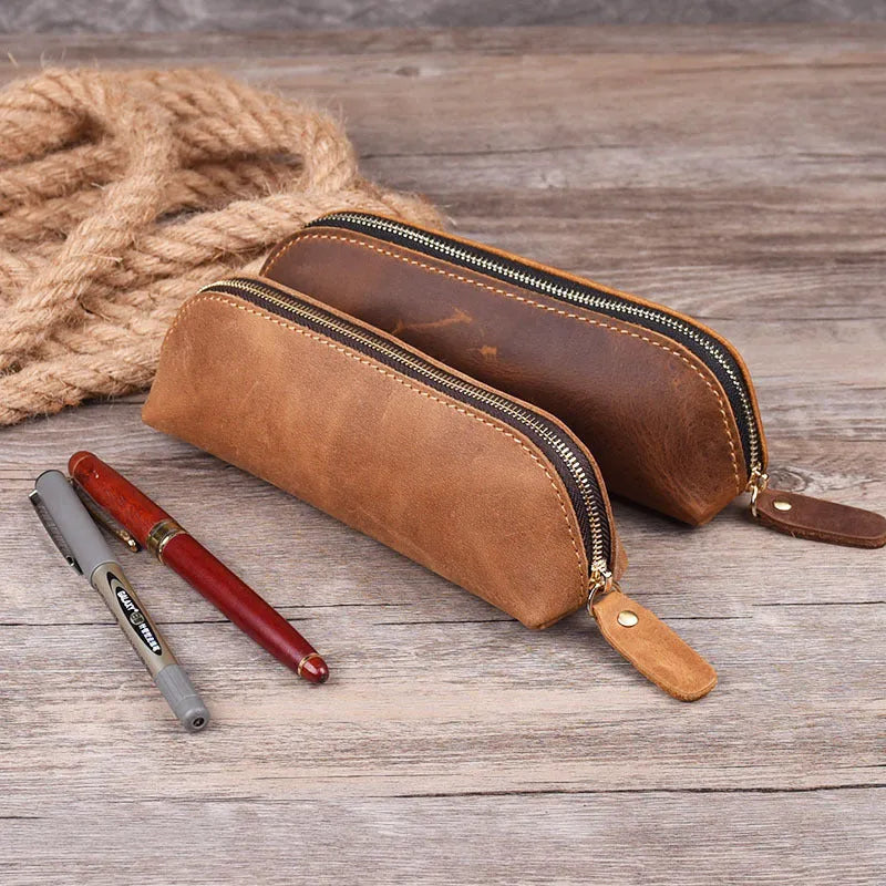 Genuine cowhide leather pencil case with zipper closure measuring 18cm long