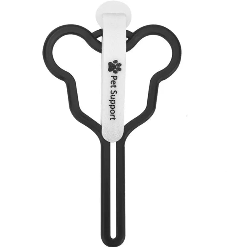 A dog poo bag holder with a hands-free clip and black Velcro strap attached to a leash.