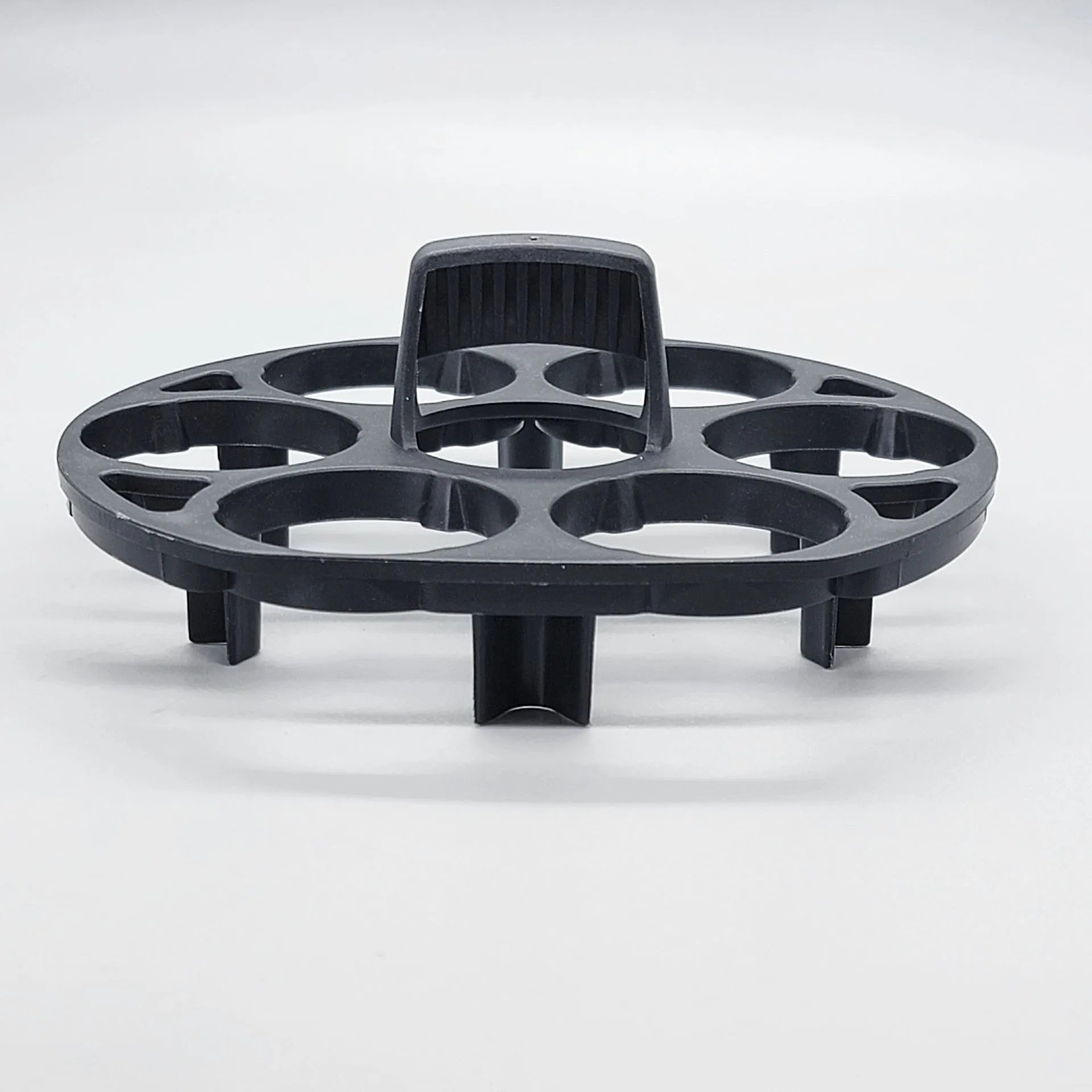 Black plastic egg holder rack measuring 13.8 by 12.6 cm for kitchen organisation