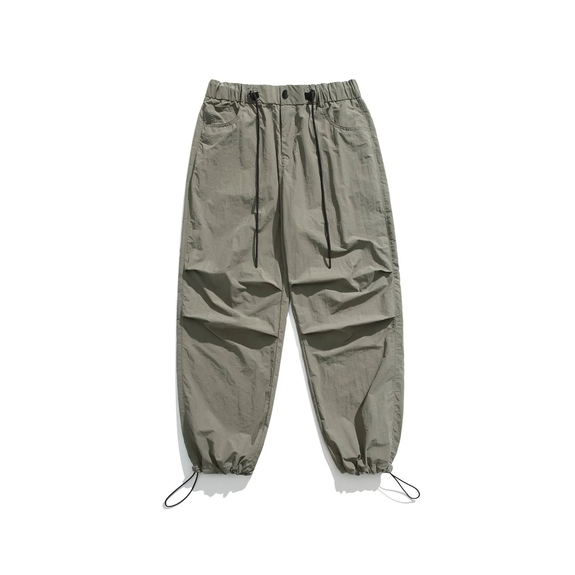 Men's loose straight-leg casual trousers in thin ice silk nylon fabric, shown in apricot colour.