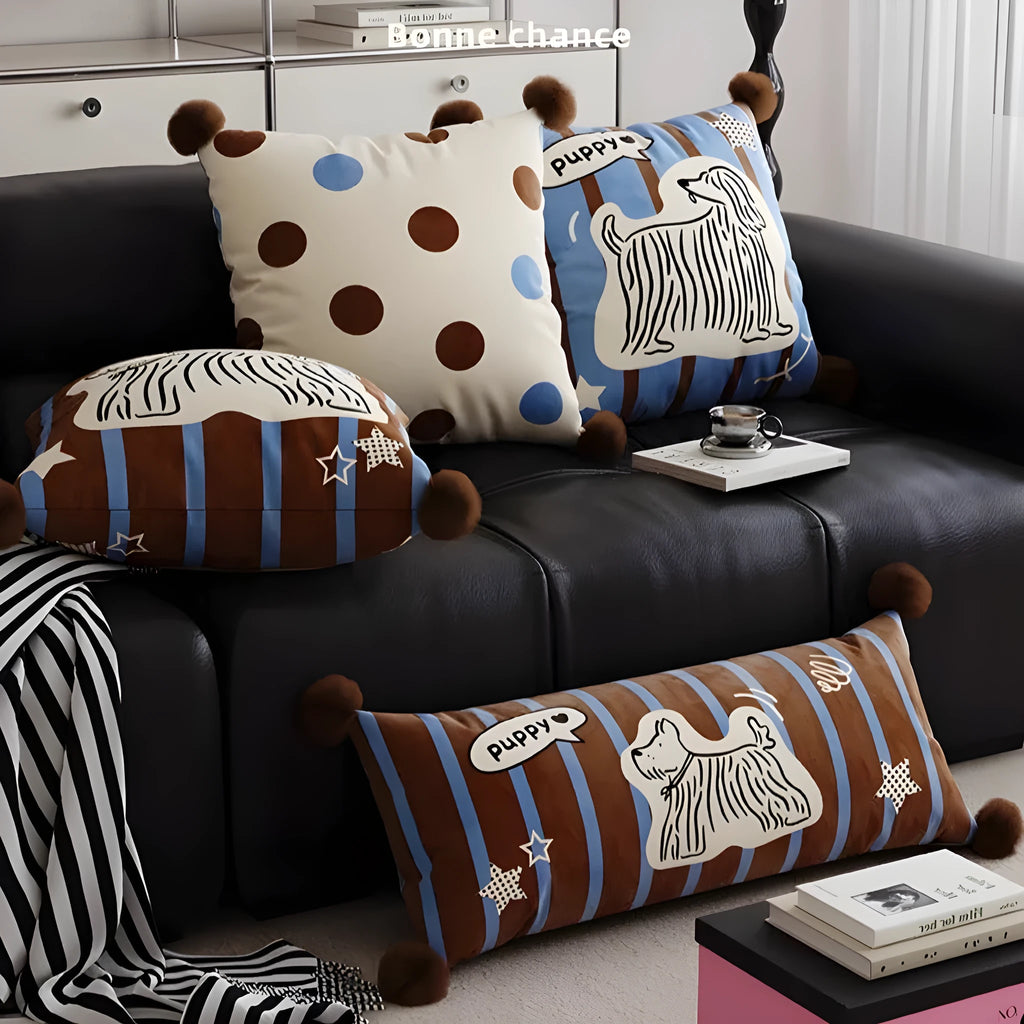 Blue cartoon animal printed sofa cushion pillow on a grey sofa