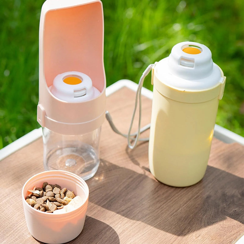 Green 2-in-1 travel dog water bottle with lanyard showing food and water compartments