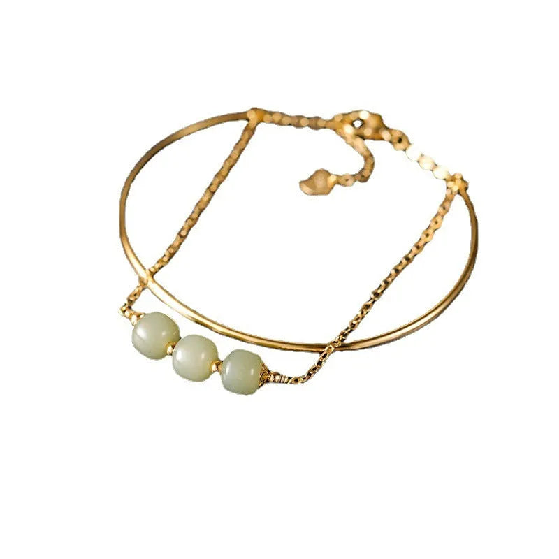 Women's jade lucky beads bracelet with gold inlay design in single, double, and three bead versions