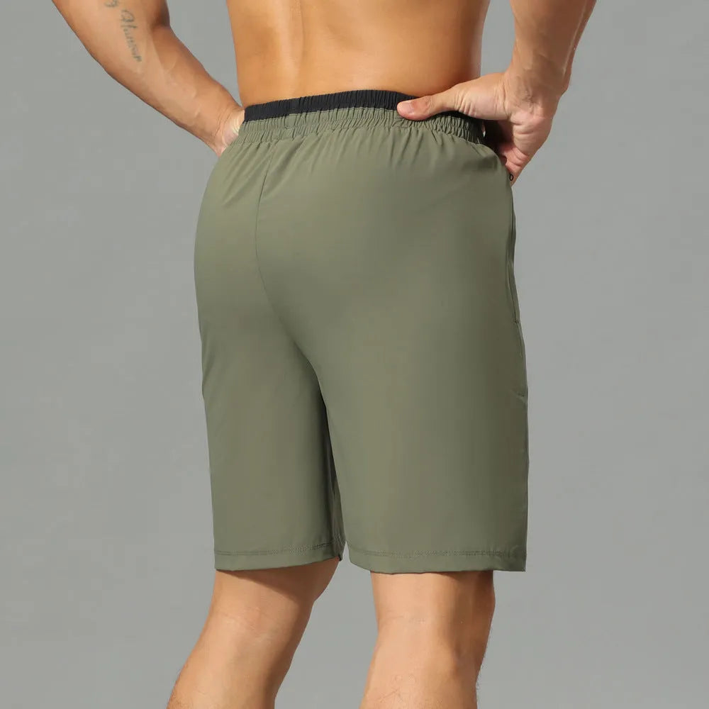 Men's loose ice silk cropped running pants in Army Green, shown in a relaxed fit for sports.