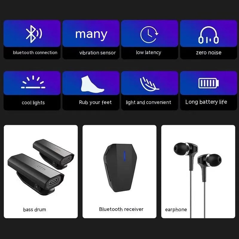 Black somatosensory air drum kit with wireless host unit, two drumsticks, and charging accessories on dark background
