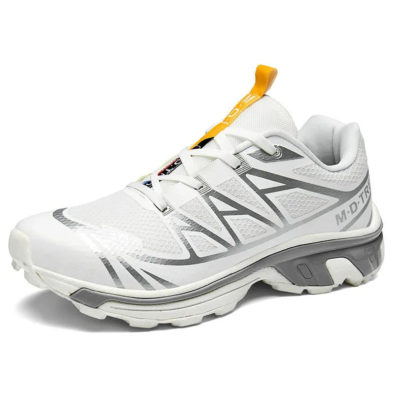Pair of low-top hiking shoes in artificial leather with a mesh lining and rubber sole.