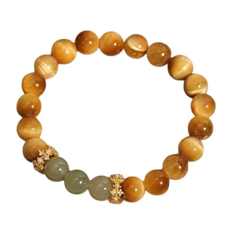 Natural yellow tiger's eye stone bracelet showing golden gourd, bamboo joint, and lace pattern variations