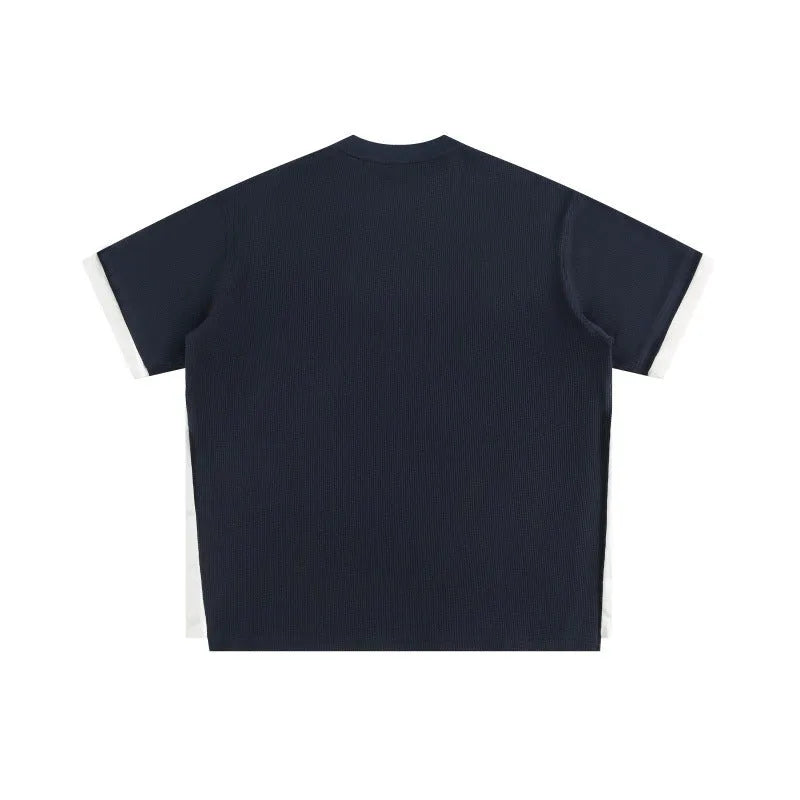 Retro alphabet embroidered loose waffle T-shirt in polyester fabric available in multiple colours
