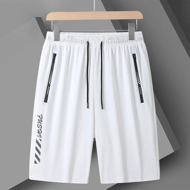 Men's black quick-dry loose-fit nylon sports shorts on a size chart background