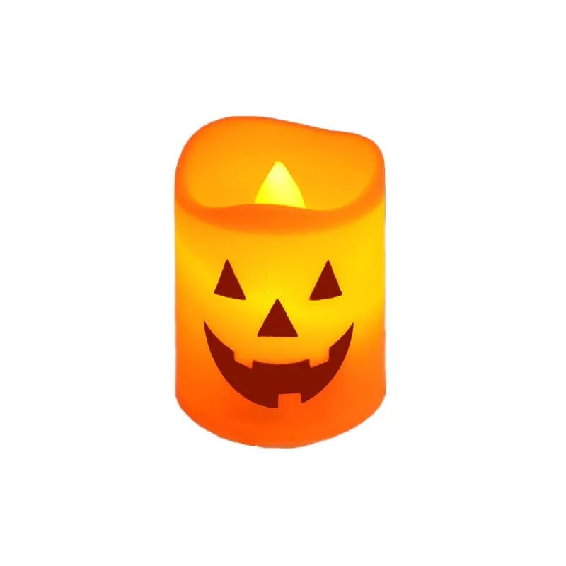 Set of six plastic pumpkin-coloured Halloween electric candle lamps in European style on a dark background