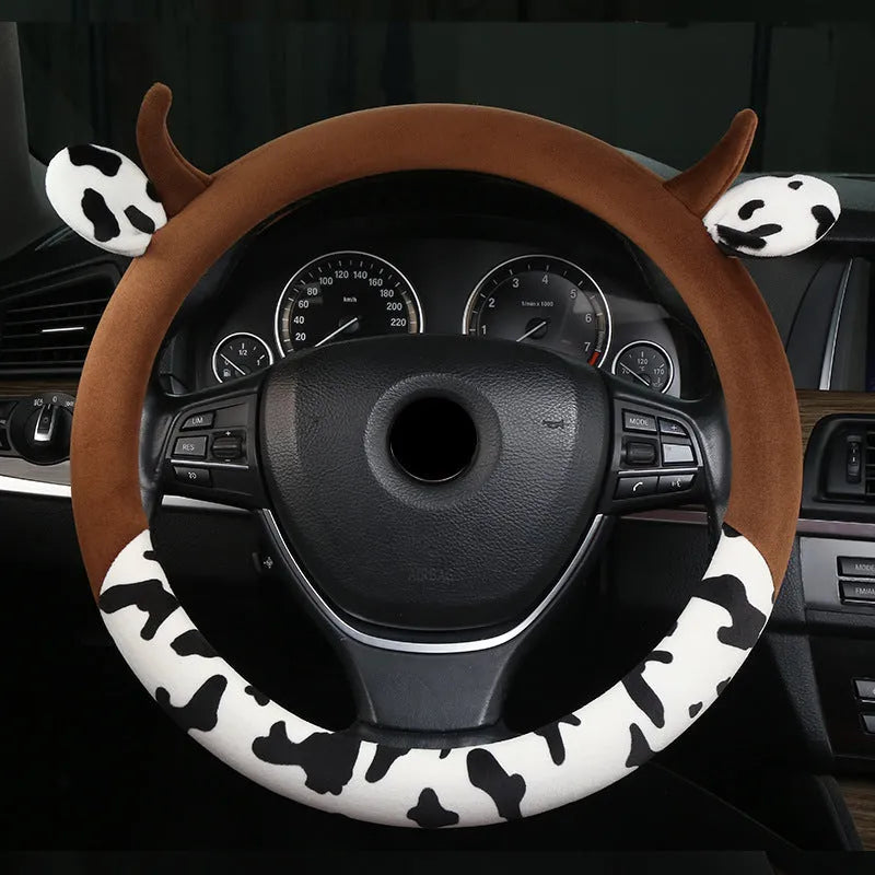 Short plush automotive steering wheel cover in black or coffee colour options showing soft fabric texture