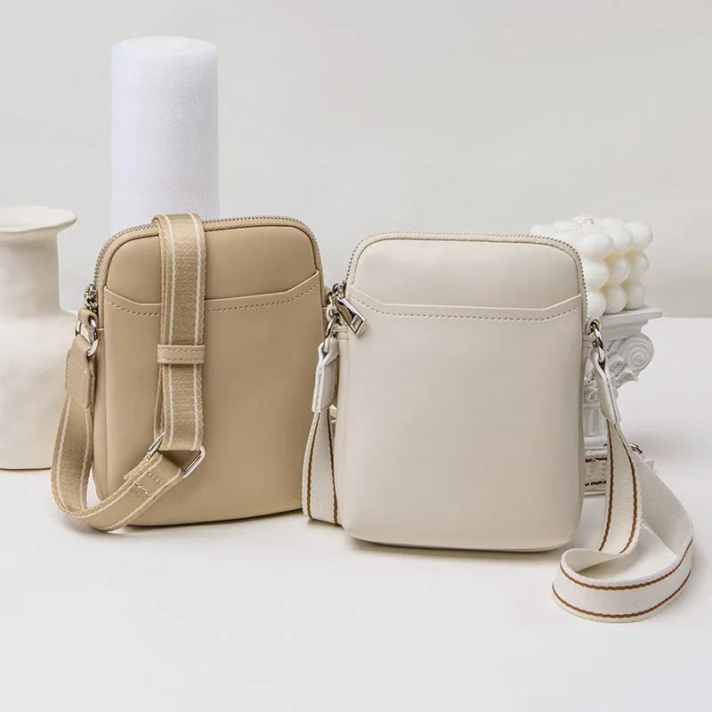 Solid colour PU leather crossbody phone bag in beige, shown with adjustable strap.