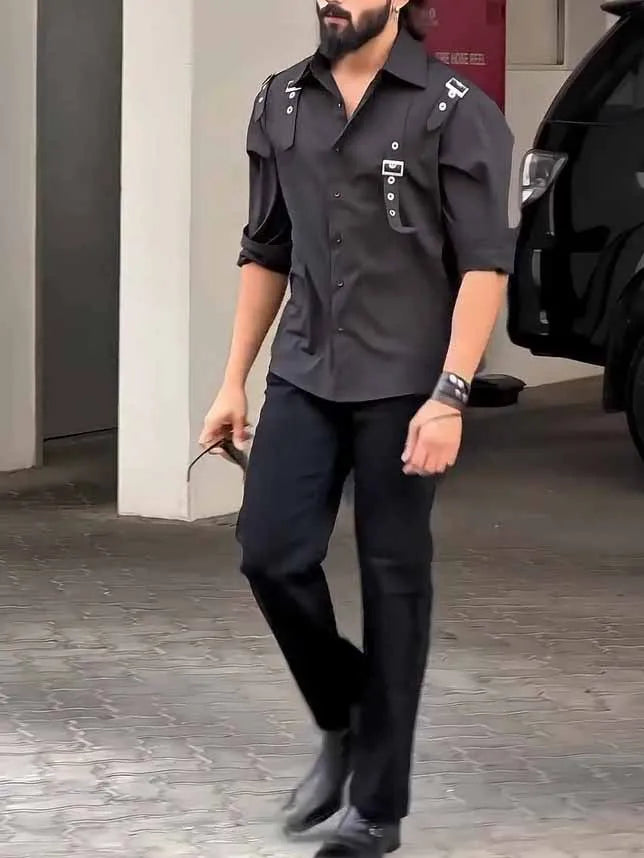 Men's black utility style button-up shirt with a regular fit on a hanger.