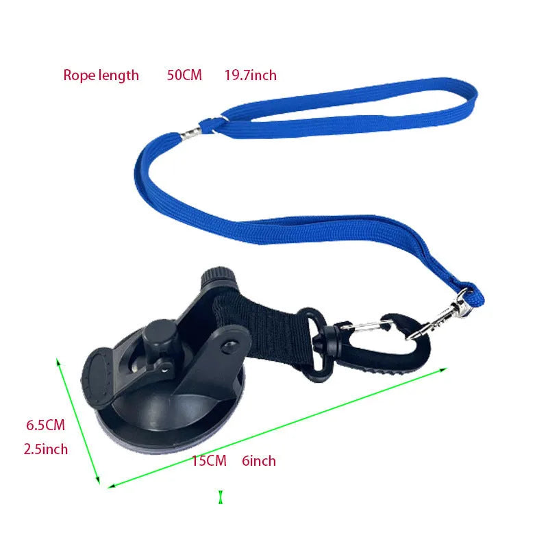 Pet bath restraint kit with four blue suction cup handcuffs and a connecting rope on bathroom tiles.