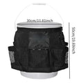 Black cylindrical polyester buggy storage bag hanging from a 5-gallon barrel.