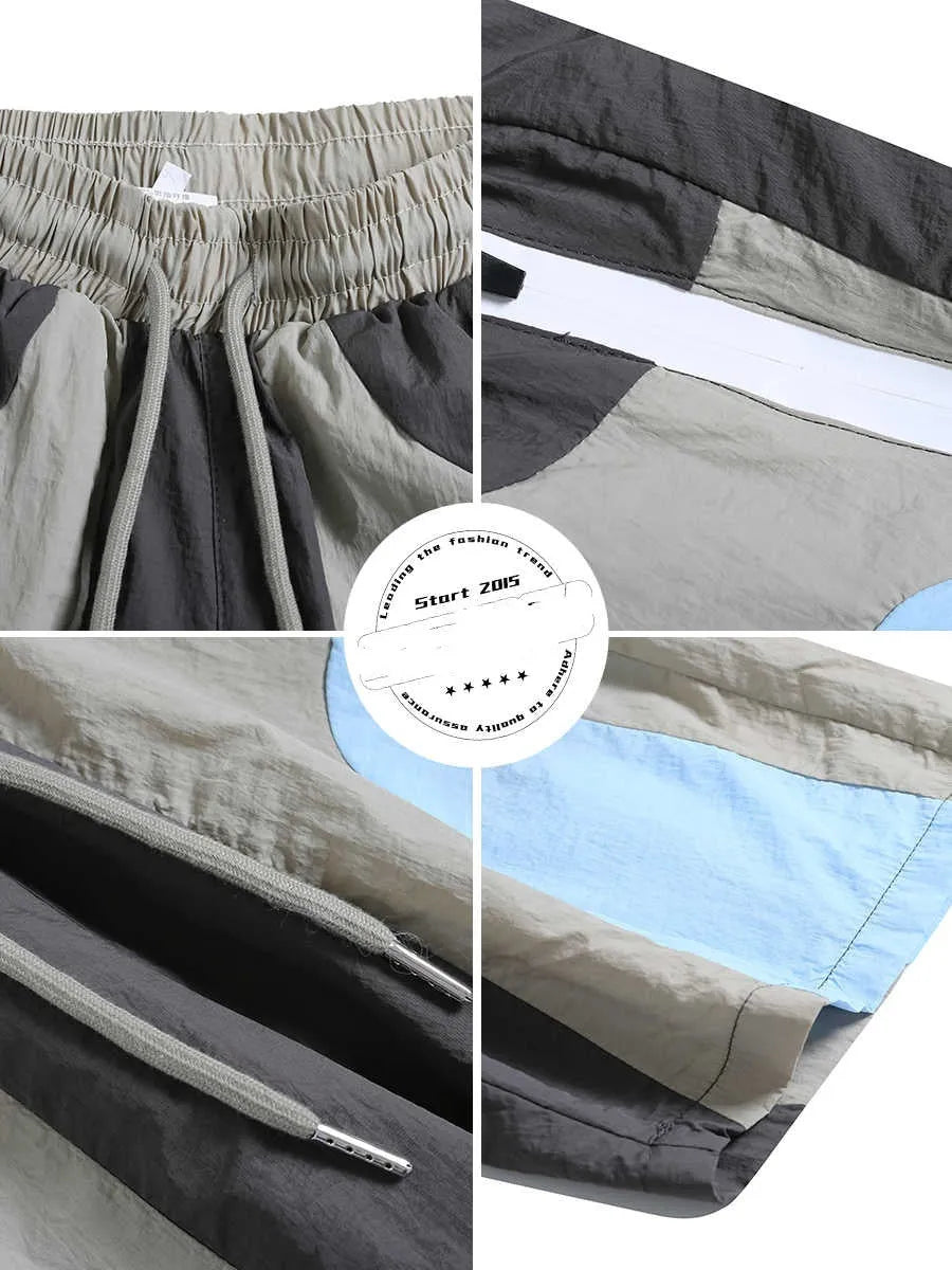 Blue patchwork outdoor sports shorts with loose straight-leg fit and above-the-knee length