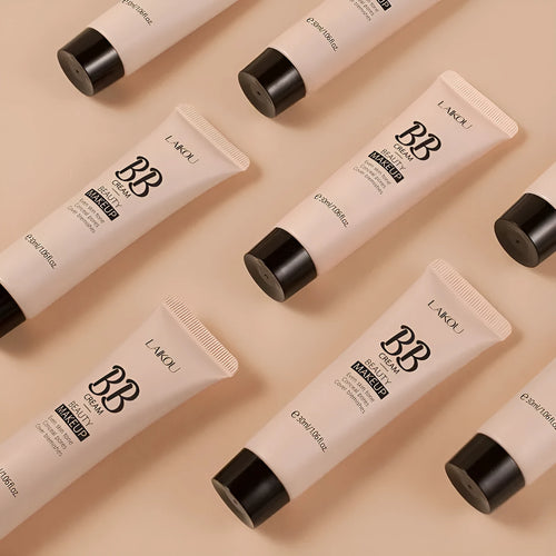 30ml tube of BB cream shown with swatches of its nine shades from light to dark.