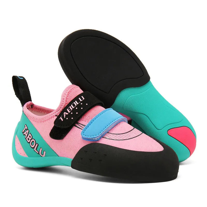 Men's and women's beginner rock climbing shoes with Velcro straps and coloured trim.