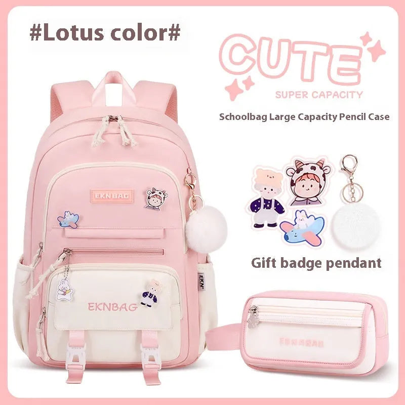 Pink waterproof Oxford cloth school backpack for girls with curved shoulder straps.