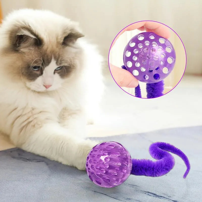 Interactive TPR bouncy ball cat toy with soft plush worm tail in green, pink or purple