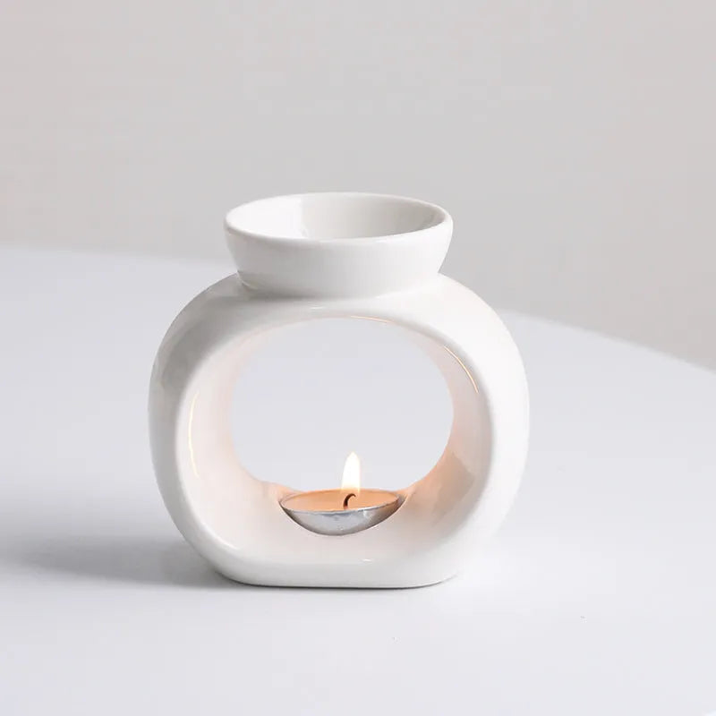 White Nordic style ceramic aromatherapy stove ornament with anti-dry burning design