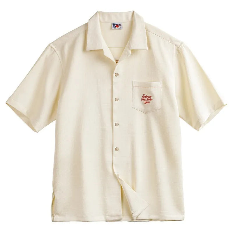 Men's light apricot shirt with bamboo leaf pattern and a Cuban collar on a short sleeve design.