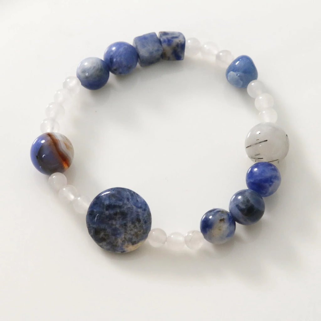 Hand-woven natural stone bracelet with blue point and black hair crystal agate beads