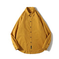 Man wearing a loose-fit Japanese style cotton cardigan shirt in a summer colour.