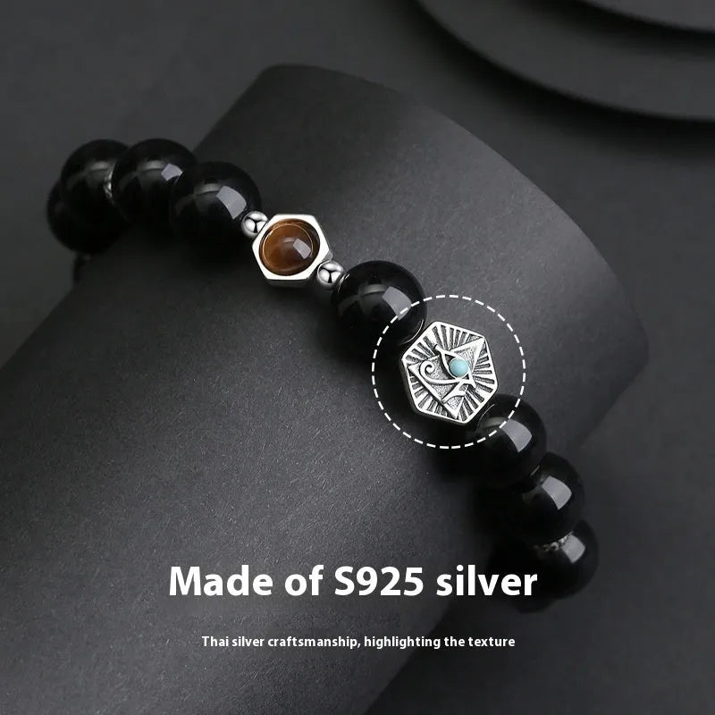 Men's sterling silver bracelet with obsidian god's eye geometric design