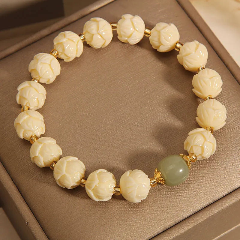 Buxus microphylla lotus bead bracelet for women with Hetian jade and flower-shaped simple design