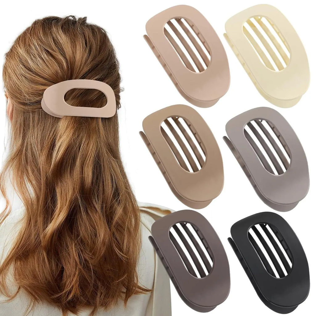 Six rose red plastic hair clips with frosted grip and quadrilateral design arranged together