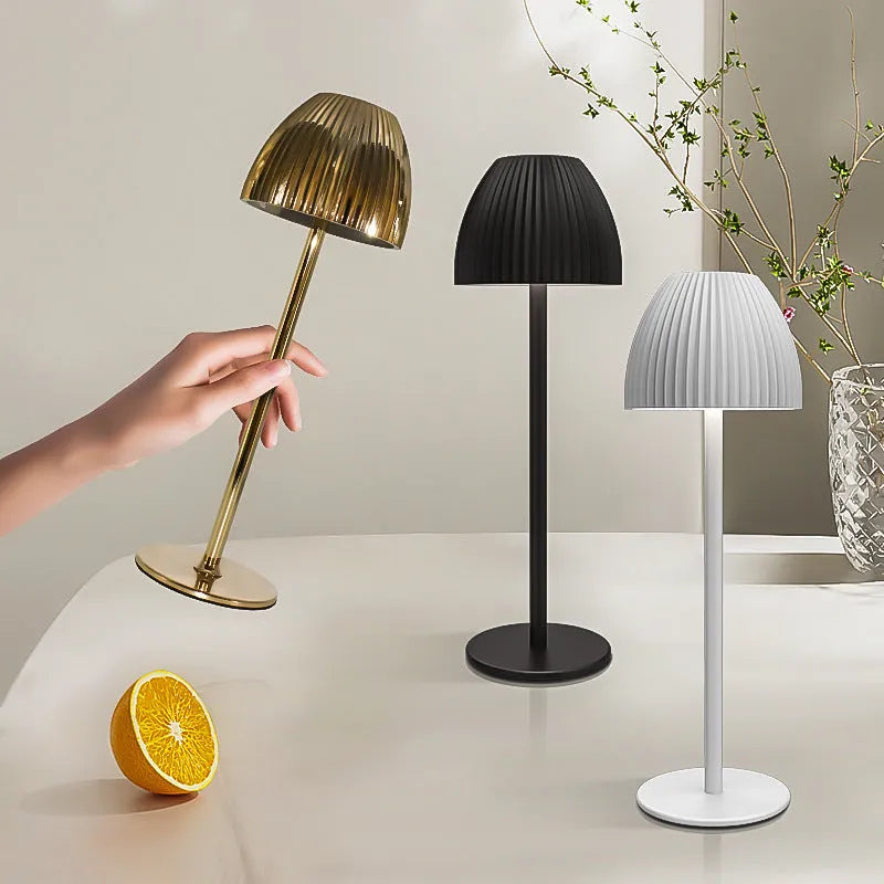 Modern dimmable night lamp with circular base in black or white colour options