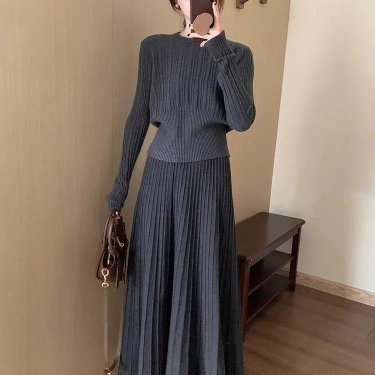 Women's dark grey knitted two-piece dress suit with 3D pattern and ethnic collage stitching.