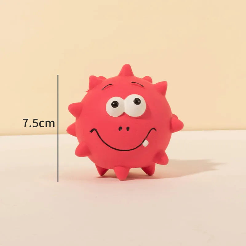 Set of four coloured squeaky dog balls with cute faces, made from natural latex rubber.