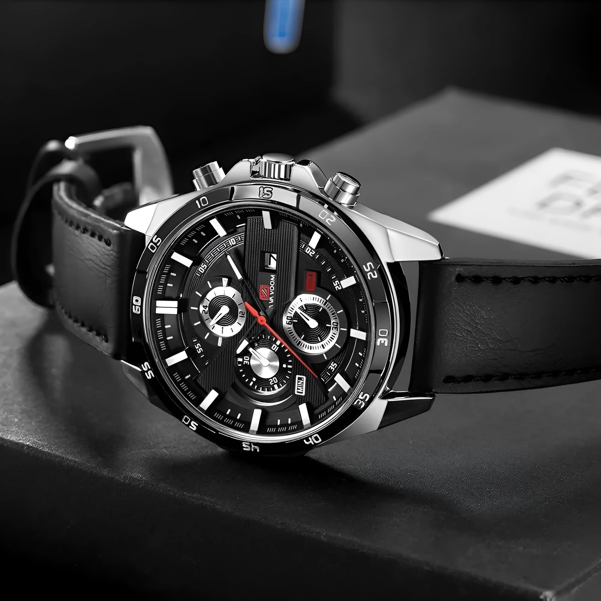 Men's casual quartz watch with business calendar on leather strap in rose gold and black colourway.