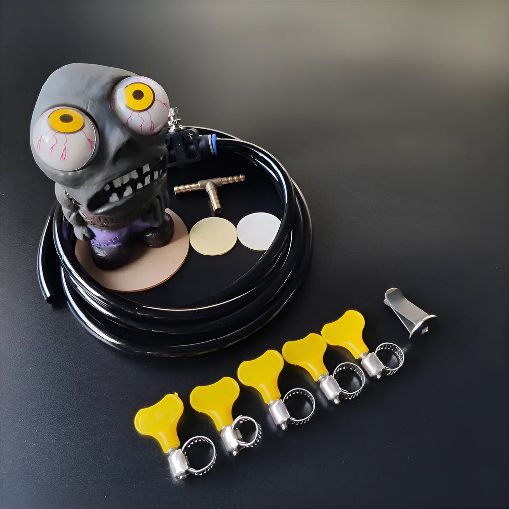 Turbo car decompress ornament doll kit with pressure valve, copper tube, and clips on a white background.