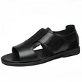 Men's black casual leather sandals with open toe design and rubber sole