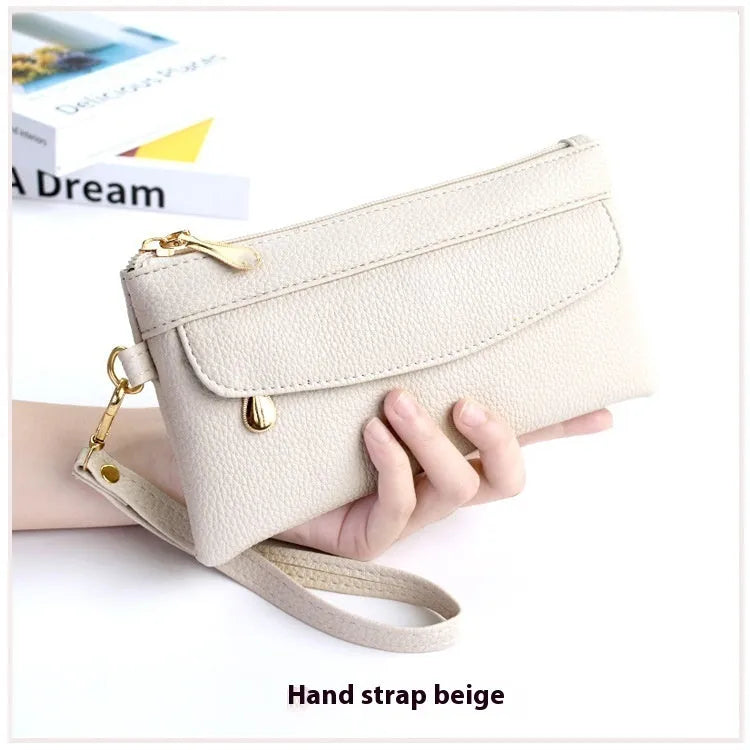 Soft PU leather crossbody bag in a square shape showing the internal sandwich zipper pocket.