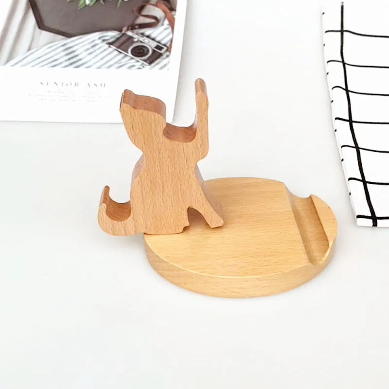 Handcrafted beech wood and resin lazy bracket mobile phone holder on a wooden desk