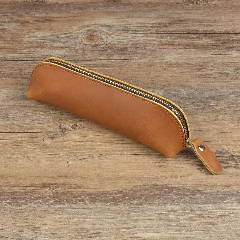Genuine cowhide leather pencil case with zipper closure measuring 18cm long