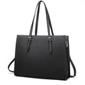 Large black women's business shoulder bag showing triple strap options and internal organisation compartments