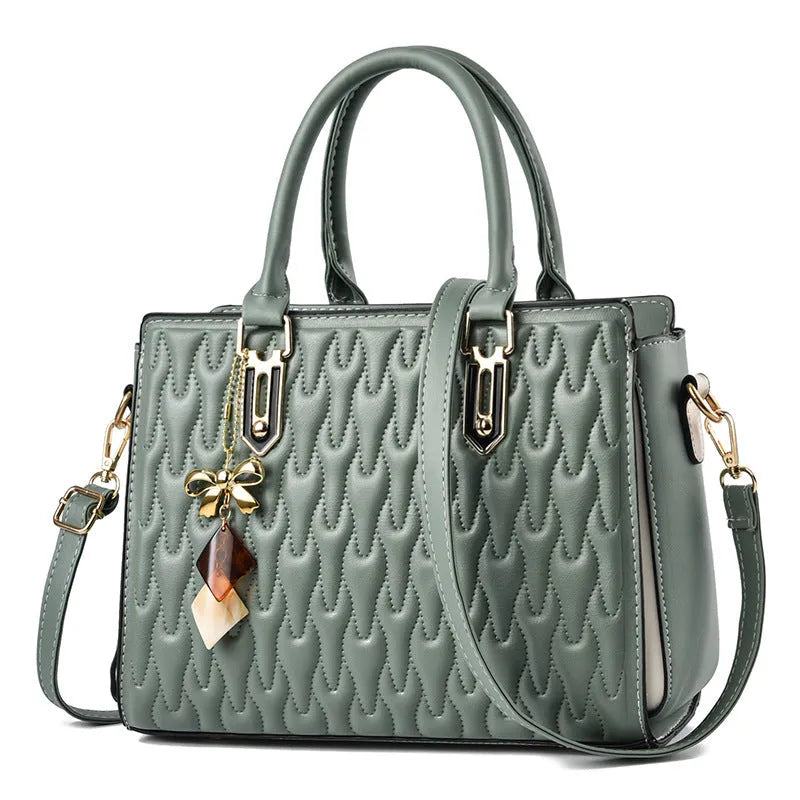 Women's large simple shoulder messenger bag in polyester available in five colours.