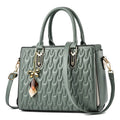 Women's large simple shoulder messenger bag in polyester available in five colours.