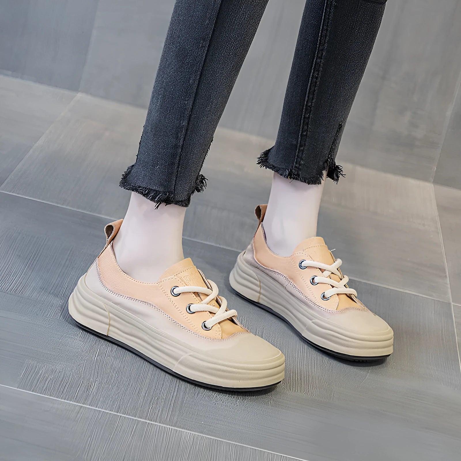 Women's matcha green leather platform sneakers with round toe and white laces on a flat sole.