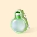 Green portable dog water bottle with fold-out drinking bowl for travel.