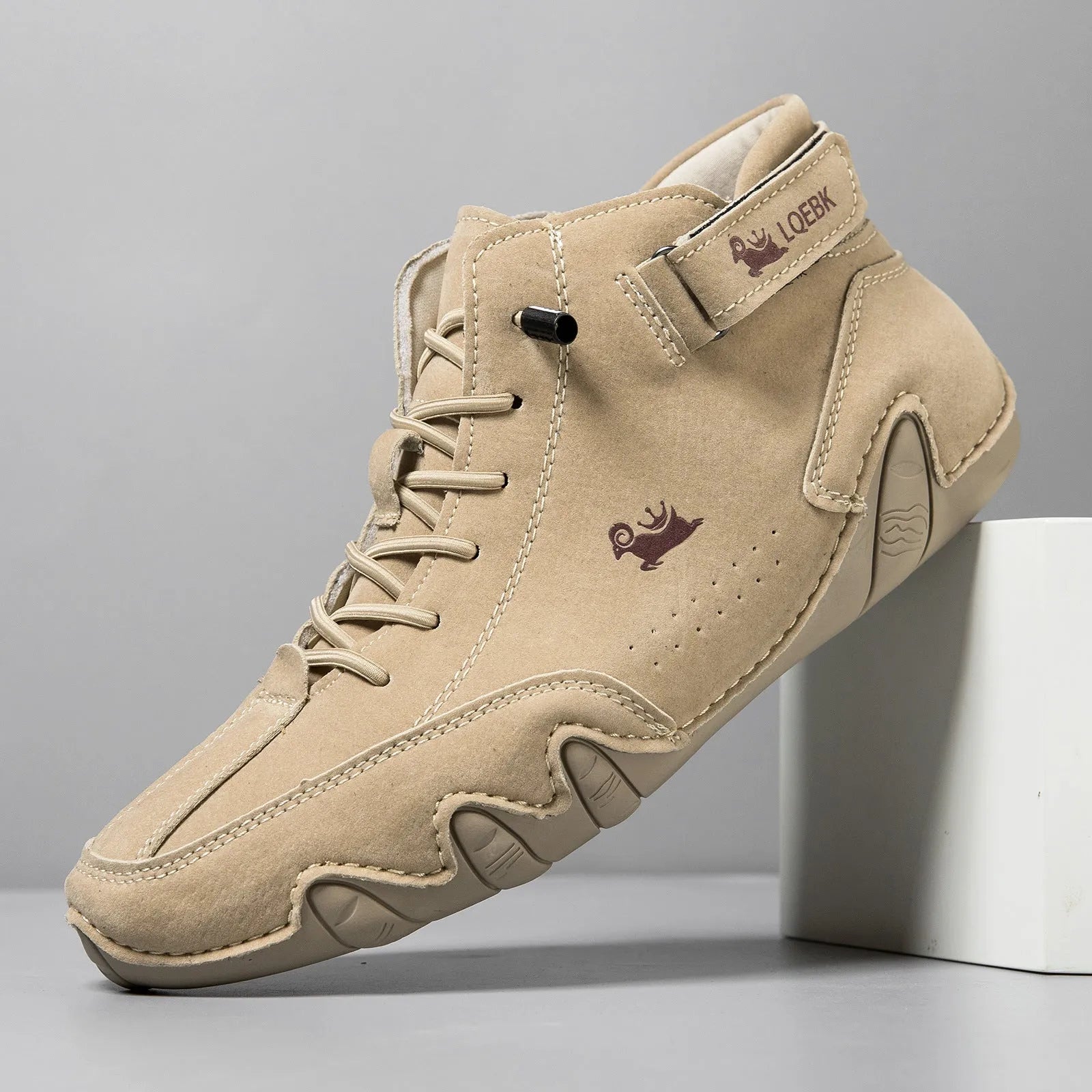 Men's brown high-top casual Martin boots with round toe and flat rubber sole.