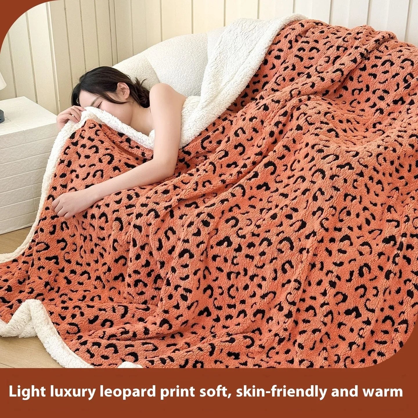 Double-layer cationic leopard jacquard taffeta blanket showing reversible design with zebra pattern