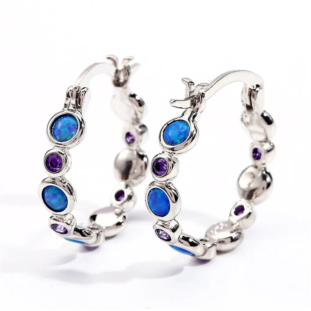 Round synthetic opal and cubic zirconia clip-on earrings in electroplated copper